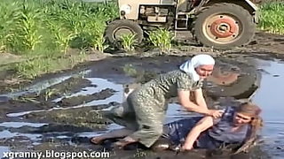 Erotic female mud older wrestling